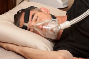 man with Sleep Apnoea and CPAP